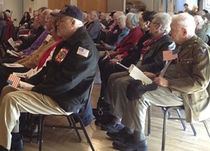 Veterans listen to the chorus during last Friday's Veterans Celebration at the Redmond Senior Center.