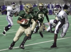 Redmond’s Michael Conforto runs upfield during last Friday’s game against Garfield. Redmond won