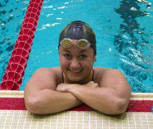 Redmond High senior Aly Davis has achieved rare 'Ironwoman' status