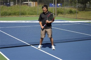 Overlake School girls' head tennis coach Jim Uyesugi