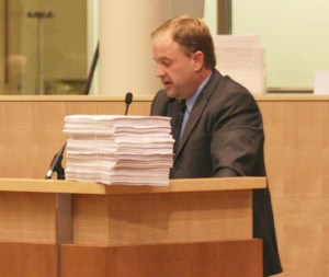 Scott Harlan speaks in favor of an initiative to restrict the city's use of traffic-enforcement cameras at Tuesday's City Council meeting.