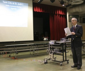 City of Redmond principal planner Steve Fischer speaks to Redmond residents at a public meeting about Tent City 4. The encampment
