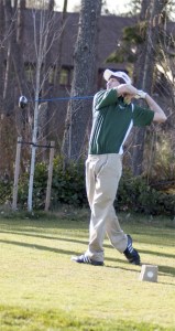Overlake School junior Reid Fredrickson tees off during a practice round at The Golf Club at Redmond Ridge on Wednesday. Fredrickson