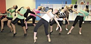 Students rehearse for the Redmond Academy of Theatre Arts’ debut performance