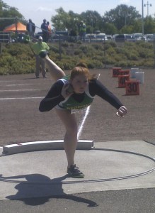 Redmond High School senior Jessica Kinssies once again broke her own school record in the shot put