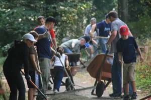 Volunteers work on the Hartman Trail last Saturday during The Church of Jesus Christ of Latter-day Saints' Day of Service.
