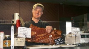 Scott Molyneaux is the lead butcher and essentially “the face of Bill the Butcher” at the new Bill the Butcher shop at 7990 Leary Way NE in downtown Redmond. A trained chef