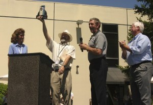 Aerojet's Redmond employees and alumni celebrated July 8 as the United Space Alliance (USA) presented the company with the prestigious Space Flight Awareness Supplier Award. From left to right on the podium are Julie Van Kleeck