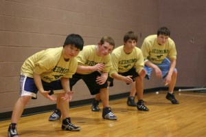 Redmond High wrestlers (from left to right) Catherine Kelly (119)