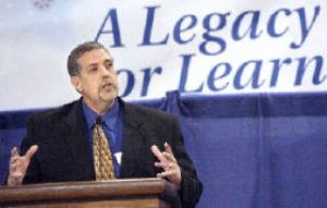 LEFT: LWSD superindendent Dr. Chip Kimball speaks about leaving a legacy during the Lake Washington Schools Foundation Luncheon at Juanita High School on Wednesday. RIGHT: Jarod Holt