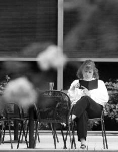 Mild temperatures and partly cloudy skies earlier this week allowed city employee Sandra Cantelon to use her lunch break to read a book on the deck area outside City Hall.