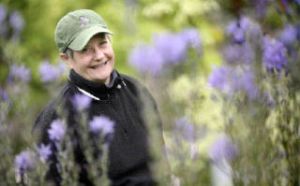Joanne White stands in her garden