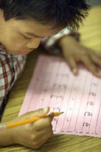 Kaytal Keo works on a penmanship lesson in Mrs. Luthra’s class at John Muir Elementary earlier this week. Keo was one of several students who attended an ELL Jump Start program for incoming kindergarten students who speak English as a second language.