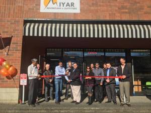 Redmond Mayor John Marchione cuts the ribbon at Miyar Adventures&rsquo; opening this month.