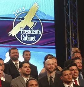 Joshua Kohn (center) was recently recognized as a President’s Cabinet Award recipient with Verizon in Switzerland.