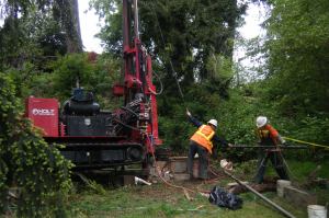 King County workers do initial survey work in preparation of replacing four and a half miles of sewer pipeline in the Redmond area.