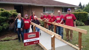 Yaeko and Tosh Funai (center) surrounded by Rampathon workers at their Redmond home.