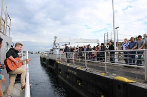 Redmond’s Dylan Sabine plays a tune on board a ship during his month-long internship with the University of Washington School of Oceanography. Courtesy photo