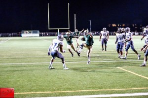 Redmond’s Joel Hargin (7) celebrates one of his two touchdowns against Heritage. Courtesy of Marc La Pierre