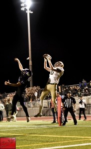 Devon La Pierre hauls in the winning two-point pass during Redmond’s thrilling 28-27 double-overtime win over Lake Washington on Friday. Courtesy of Marc La Pierre