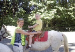 King County Councilmember Jane Hague poses with Tavish McArthur