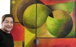 Artist Brian Major stands next to one of his canvas oil painting he recently created. Major will re-create Picasso’s “Aubade” in front of City Hall on Friday.