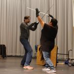 William Elsman (left) and Amy Lizardo of the Oregon Shakespeare Festival&rsquo;s School Visit Program engage in a staged sword fight at Rose Hill Middle School in Redmond. Samantha Pak, Redmond Reporter