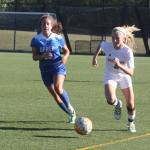Overlake&rsquo;s Alex Hobbs, right, has 12 goals and nine assists this season. Andy Nystrom, Reporter
