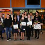 Back row, from left: Kate Atvars, Amy Hedin, Jerred Kelley, Roger Blier, Angela Marks, Dan Phelan and Katie Searle. Front row, from left: Teen CEO Third-place winner Aarushi Bhatnagar, first-place winners Adriana Rush and Indra Toepke. Not Pictured: Second-plaec winner Anne Lee. Courtesy Photo