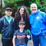 Back, from left Anthony Seo, Amy LaFranca and Matt Fleming. Front, Edmund Raine. Microsoft employees Seo and Fleming built a 3-D printed prosthetic arm for Edmund after his mother, LaFranca, sent out a request to the Microsoft Garage. Courtesy Photo