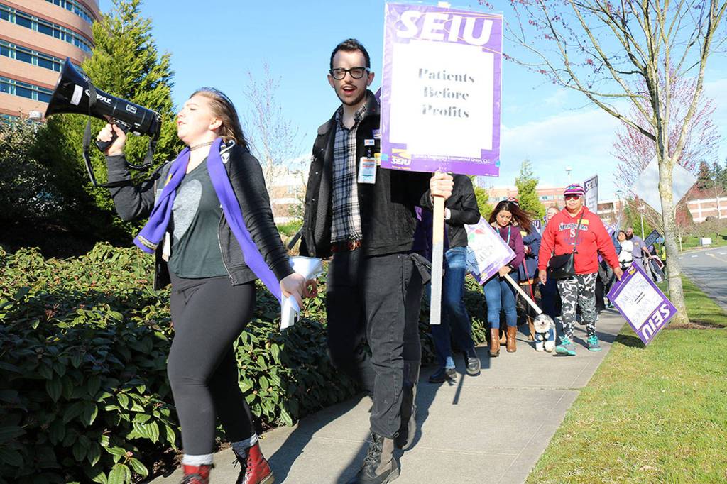 EvergreenHealth employees rally in Kirkland location for higher wages, better healthcare