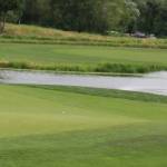 Michael Gallagher, right, putts on the 18th hole as his dad and caddie, Bill Gallagher, watches. Andy Nystrom, Redmond Reporter