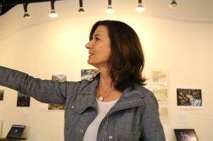 Dawn Laurant, art programs director for the VALA Art Center, discusses the Game On! The Art of Game Design exhibit. Some of the artists&rsquo; work is shown below. photos by aaron Kunkler, Redmond Reporter