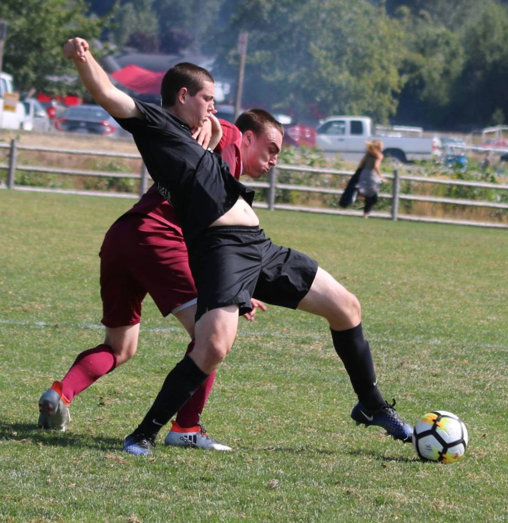 Going strong for the ball at Crossfire Challenge College Showcase