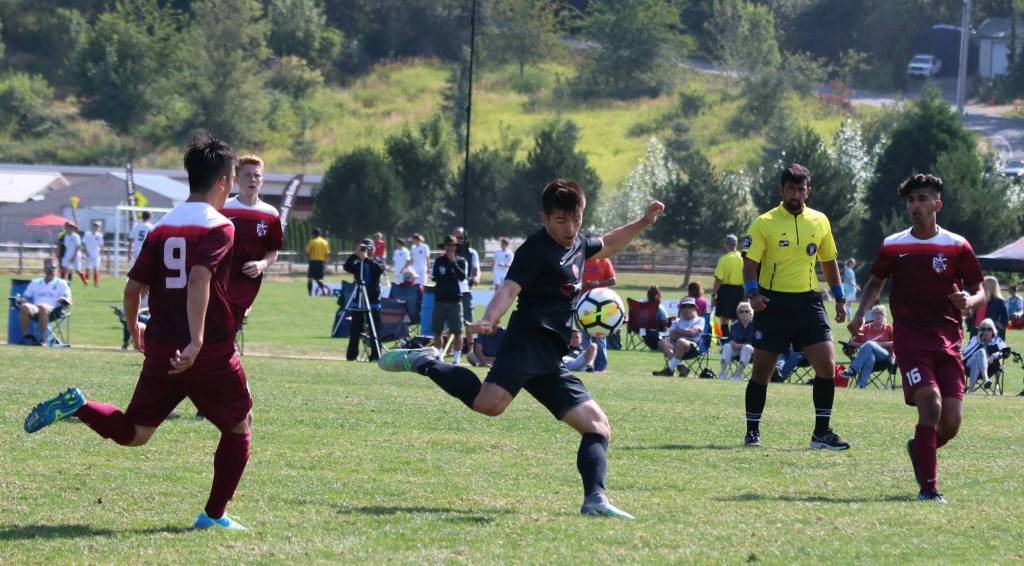 Going strong for the ball at Crossfire Challenge College Showcase