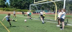 Players participate in the Redmond High School Girls&rsquo; Soccer Booster Club-sponsored Junior Stangs Soccer Camp last week at Redmond High. The camp, for girls ages 7-12, covered passing and receiving, dribbling and fun moves, shooting, agility, mini tournaments for game-like experience and more. Courtesy photo