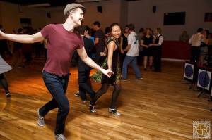 Ben White, owner of Eastside Stomp, swing dances during a recent event in Redmond. Photo courtesy of Eastside Stomp