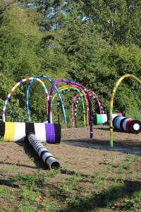 Suzanne Tidwell&rsquo;s knitted art installation of a mammoth croquet field sits on the Redmond Central Connector Phase II at Northeast 95th Street and Willows Road. It will be on display through the end of September. Andy Nystrom/Redmond Reporter