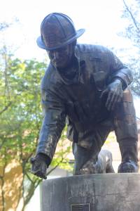 Statue outside the downtown Redmond Fire Department. Reporter file photo