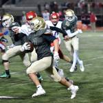 Redmond&rsquo;s Jeremy Hernandez runs past the Juanita defense. Courtesy of Marc La Pierre Photography http://marclapierre.photodeck.com/
