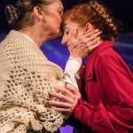 Emily Brooks receives a kiss from Pat Sibley as Marilla in Anne of Green Gables. Courtesy of Michael Brunk/ nwlens.com