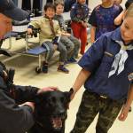 Police dog meets Cub Scout