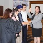 Manka Dhingra (right) is sworn in on Wednesday as the state senator for the 45th Legislative District at the King County Courthouse in Seattle. Dhingras swearing in gives Democrats a 25-24 majority in the Senate ahead of the 2018 Legislative Session. Im humbled and proud to represent the communities of the 45th Legislative District, Dhingra said. I promise to represent each and every one of my constituents with integrity, honesty and a commitment to solving problems with my colleagues  regardless of their party affiliation. We have a lot of work ahead of us. I am confident that by working together we can make progress toward a better future for our district, our state and our country. Dhingra is pictured with judge Kristin Richardson, her husband, Harjit Singh, and their two children who go to Redmond Middle School and Redmond High School. Courtesy of Sharlett Mena