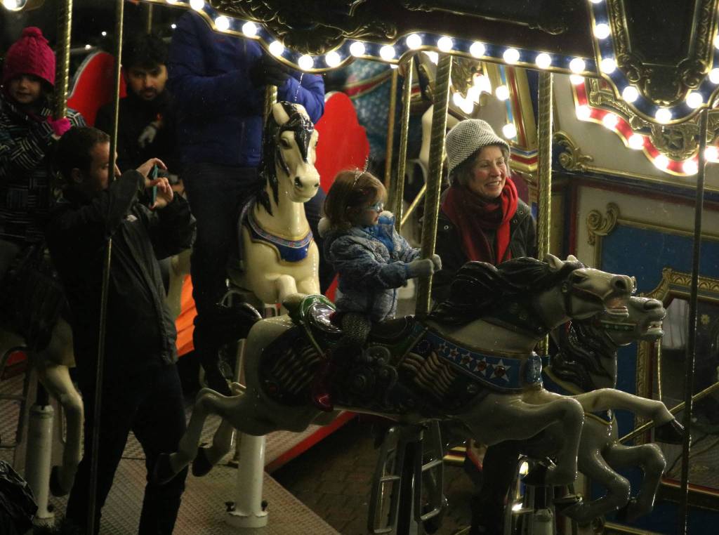 Carousel riders at Redmond Town Center.