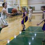 Overlakes Zach Foster, left, drives to the hoop against Concrete. Courtesy of David Chudzik
