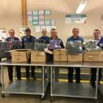 Members of St. Judes Knights of Columbus donating coats to Hopelink last week. From left to right: Dan Vache, John Bachler, Jeff Gomes, Dennis Obermeier, Ron Holtz, Joe Matthews and Daryl Remily. Courtesy photo