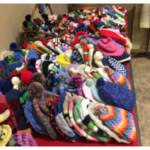 Blue Eyes, hats, mittens and scarves and The Train. Courtesy photos