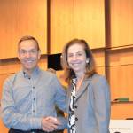 Cheri Perazzoli, right, shown meeting with former Seattle City Council member Tom Rasmussen. Perazzoli recently received the Oticon Focus on People Award for hearing-loss advocacy. Contributed photo