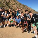 Redmond Highs boys hoops squad takes a hike on Camelback Mountain during a break from the Phoenix Cactus Jam. They are, from left, coach Scott Nelson, Aidan Rolfs, Jared Taylor, Phil Bury, Darek Khabani, Jack Thomson, Chris Claesson, coach Todd Rubin, Carson Brown, Maclain Forseth, Erik Carlson, Isaiah Vannoy, Carson Bruener and Jalen Lund. Courtesy photo