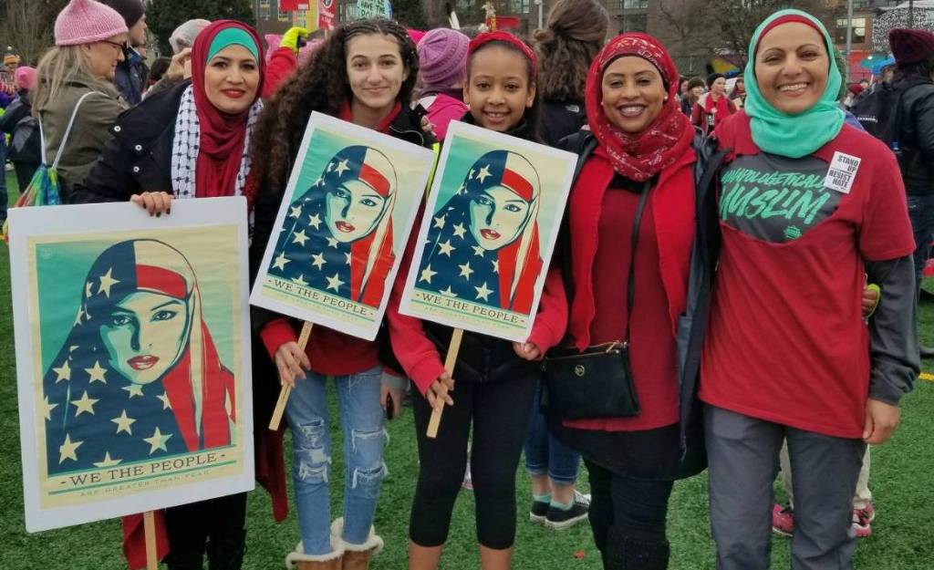 Aneelah Afzali, founder and executive director of Redmonds MAPS-AMEN, right, with other American Muslim community members at the Seattle Womens March. Courtesy of Zubeda Adem